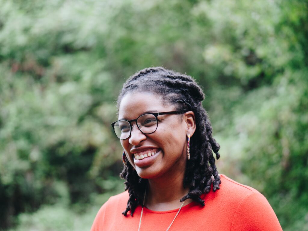 A woman smiling